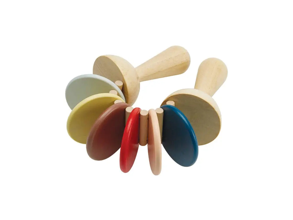A set of sustainably made Clatter Percussion Toys with multicolored discs, displayed against a white background. Each toy has a handle and several colored discs stacked along its length.