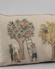Decorative pillow from the Coral & Tusk Orchard Pocket Pillow series, with an embroidered design depicting animal characters in clothing, harvesting fruit from trees, one on a ladder, and another holding a basket.