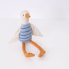 A Seagull Stuffed Animal with a blue and white striped body, orange legs, and detailed wings, crafted from knitted organic cotton, displayed against a plain white background.
