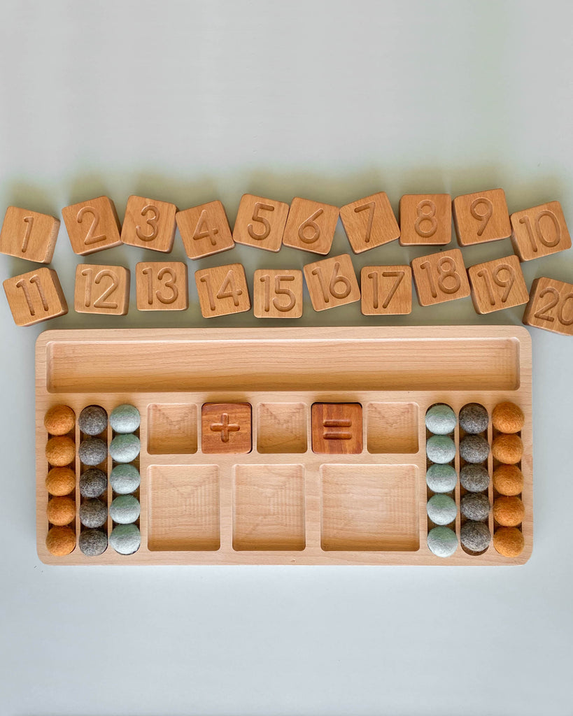 The Original Extended Math Board - Made in USA featuring number blocks, a counting frame with felt balls, and math operation symbols on a light background.