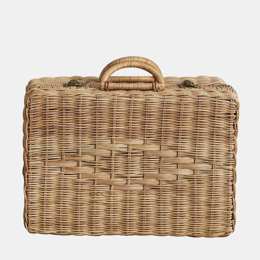 A rectangular woven natural Rattan Toaty Trunk with a handle on top and metal clasp closures, isolated on a white background.