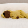 Sleeping yellow doll. 
