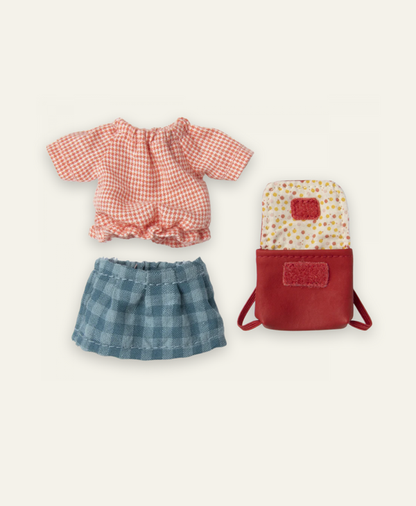 A Maileg Extra Clothing: Clothes & Bag for Big Sister - Red, consisting of a red and white checkered top, a blue plaid skirt, and a red backpack with a floral-patterned flap is neatly arranged on a white background, evoking the charm of mouse clothes for your tiny friends.