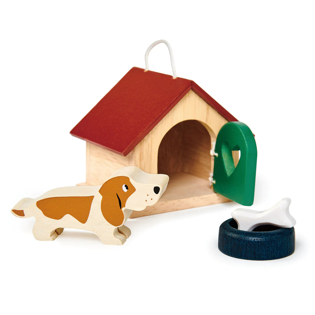 A Doghouse Set featuring a brown and white basset hound dog, a red-roofed kennel with an opening door, a green food bowl, and a blue water bowl on a white.