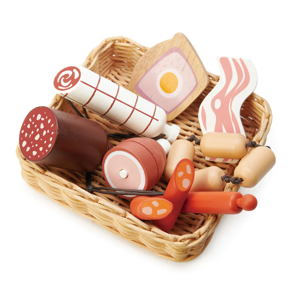 A Market Basket filled with assorted wooden play food items including meats, sausages, bacon, and an egg, designed for children's imaginative play.