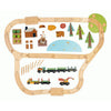 Illustration of a Wild Pines Train Set playset including tracks arranged in an oval shape, a train with three cars, trees, animals, a pond, and a house.