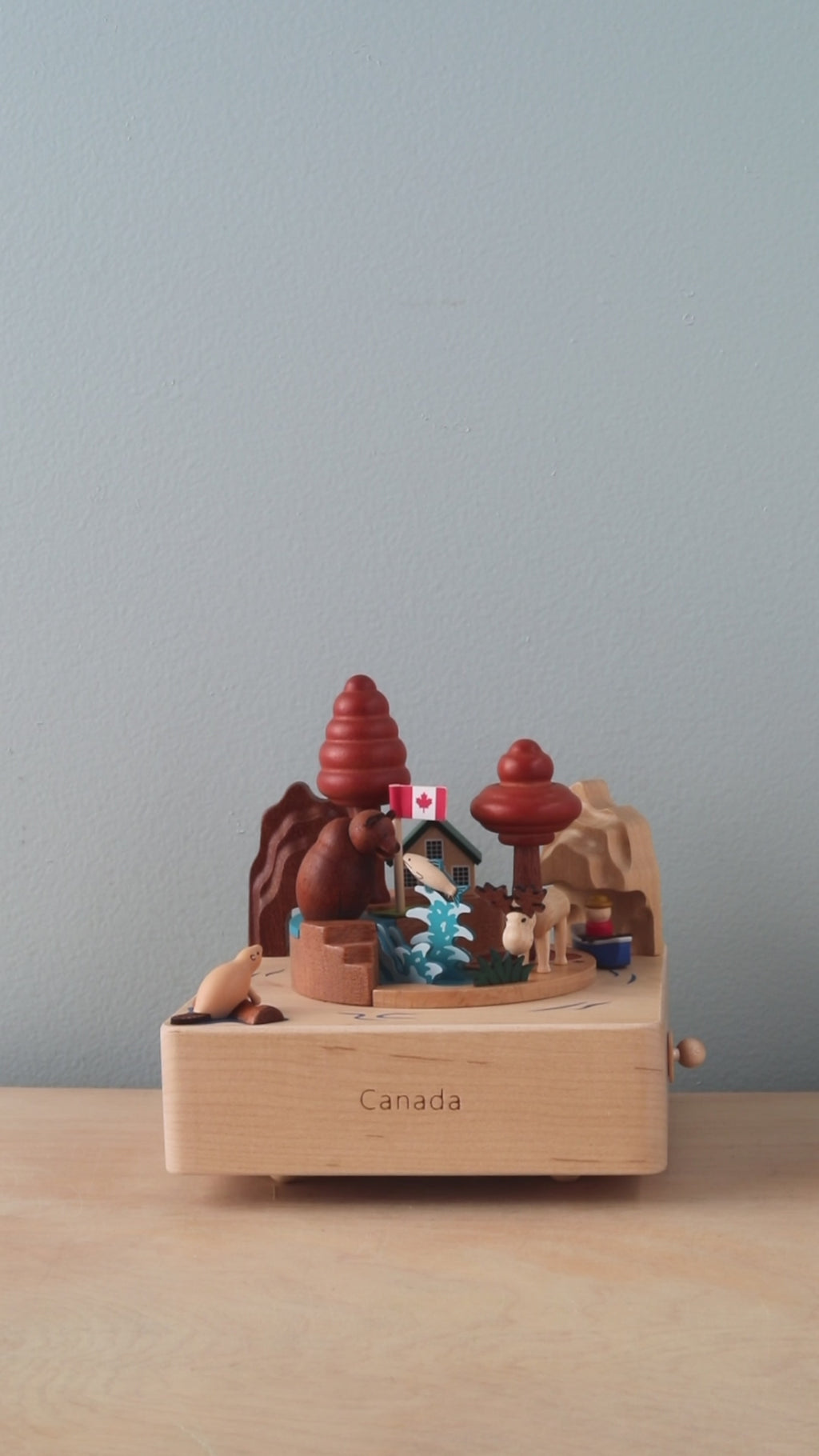 wooden music box with iconic Canadian scenery 
