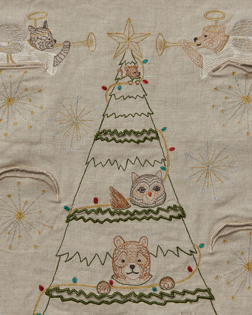 Coral & Tusk Embroidered Christmas Tree Advent Calendar on fabric featuring an owl, bears, and a squirrel, adorned with beads and golden thread accents. The tree is topped with a star.