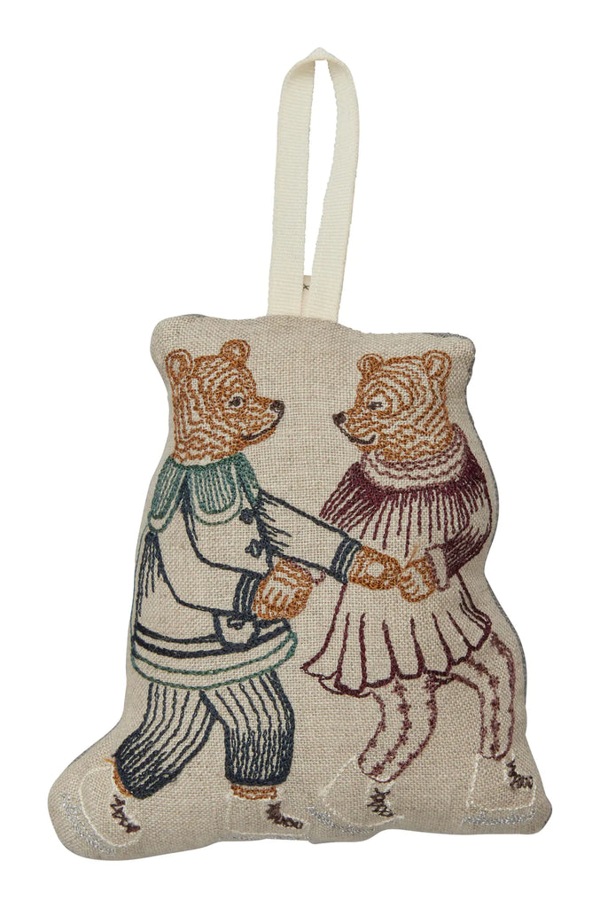 Embroidered fabric ornament featuring Coral & Tusk Ice Skater Bears Ornament, both wearing ice skates, holding hands and standing upright.