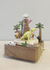 Dinosaur and volcano themed wooden music box