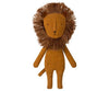 A Noah's Friends Stuffed Animal lion with a prominent, bushy mane and a simplistic, cute face, depicted against a plain white background. The lion stands upright and is made of a textured, brown fabric. This