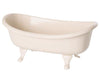 An isolated image of a Maileg Mini Bathtub in off-white color with a smooth finish on a plain background.
