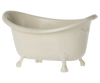 A small, off-white, vintage-style Maileg Bathtub (Miniature) with a curved backrest and four clawfoot legs. The bathtub is slightly raised from the ground and looks perfect for the Wellness Mouse in a Maileg Castle, appearing as a standalone object with no background.