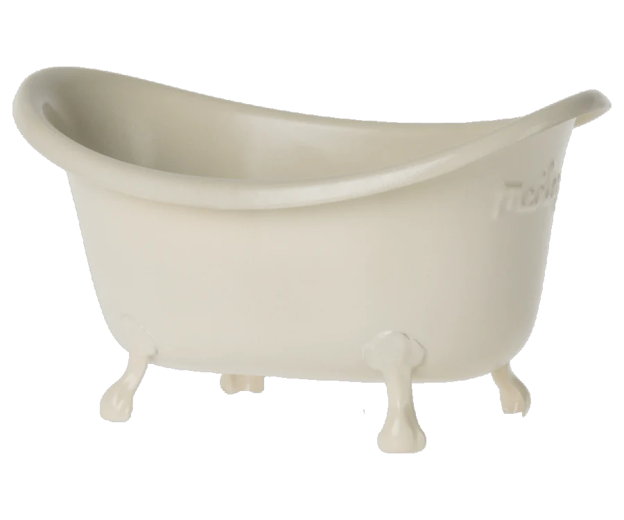 A small, off-white, vintage-style Maileg Bathtub (Miniature) with a curved backrest and four clawfoot legs. The bathtub is slightly raised from the ground and looks perfect for the Wellness Mouse in a Maileg Castle, appearing as a standalone object with no background.