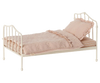 Toy pink doll bed