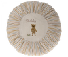 A round Maileg Cushion, Small with a central embroidered design featuring a teddy bear and the word "teddy", surrounded by striped beige and white pleated edging.