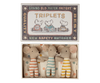 A decorative Maileg | Triplets Baby Mice In Matchbox labeled "triplets" from the grand old match factory, featuring an illustration of three baby mice in a car on the cover, and holding three plush mouse toys inside with striped outfits.