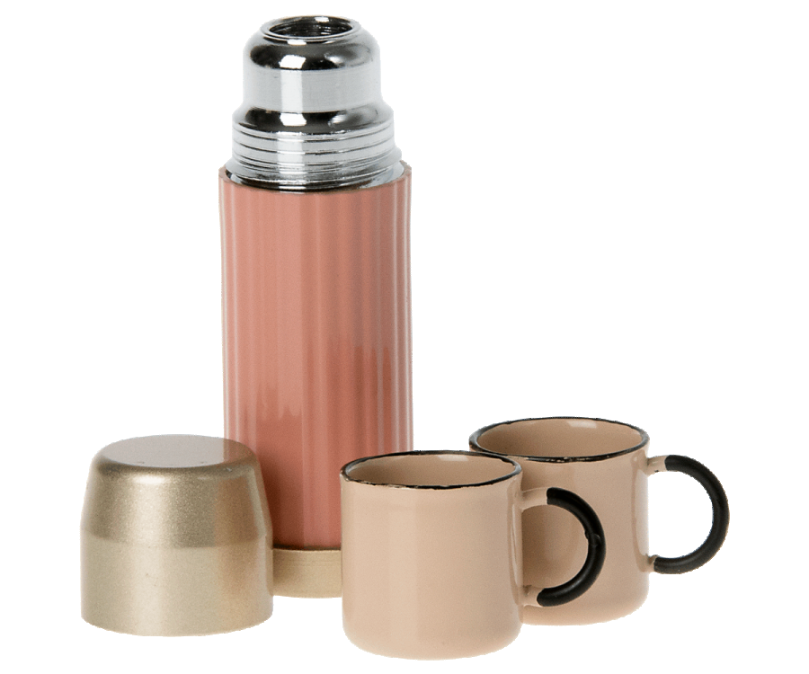 A Maileg | Miniature Thermos And Cups accompanied by two matching cups with black handles and magnetic hands, all set against a white background.