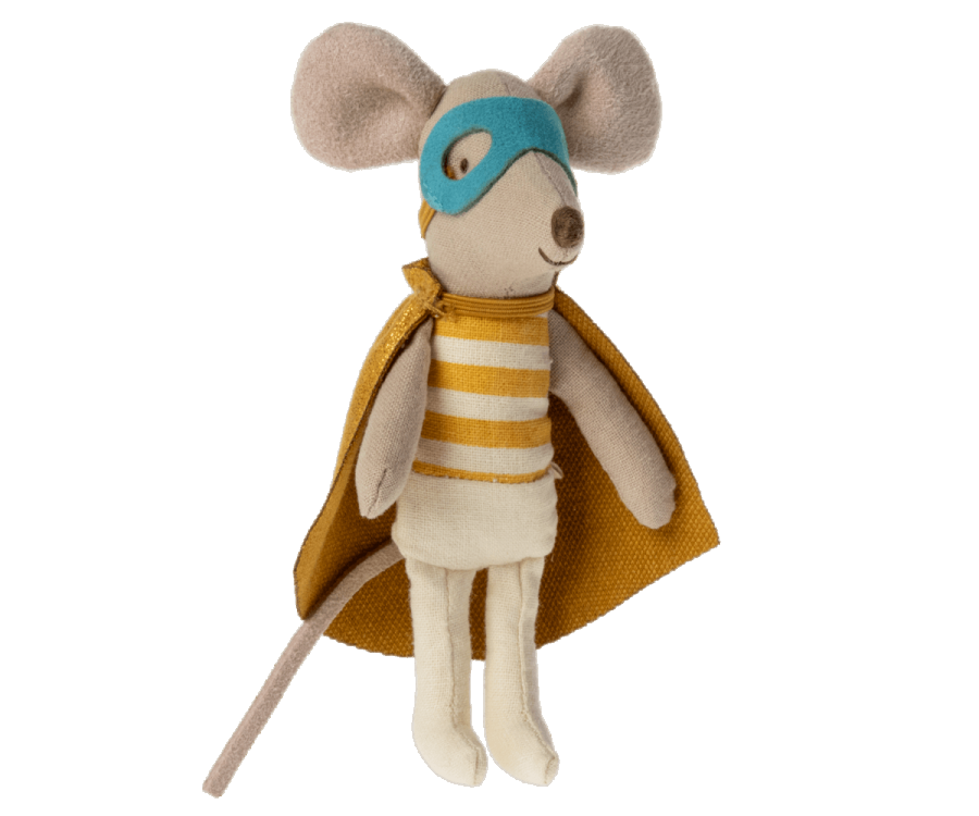 A Maileg Superhero Mouse, Little Brother dressed as a superhero, with a blue mask, yellow cape, and striped yellow and white shirt, resting in a colorful matchbox against a plain background.