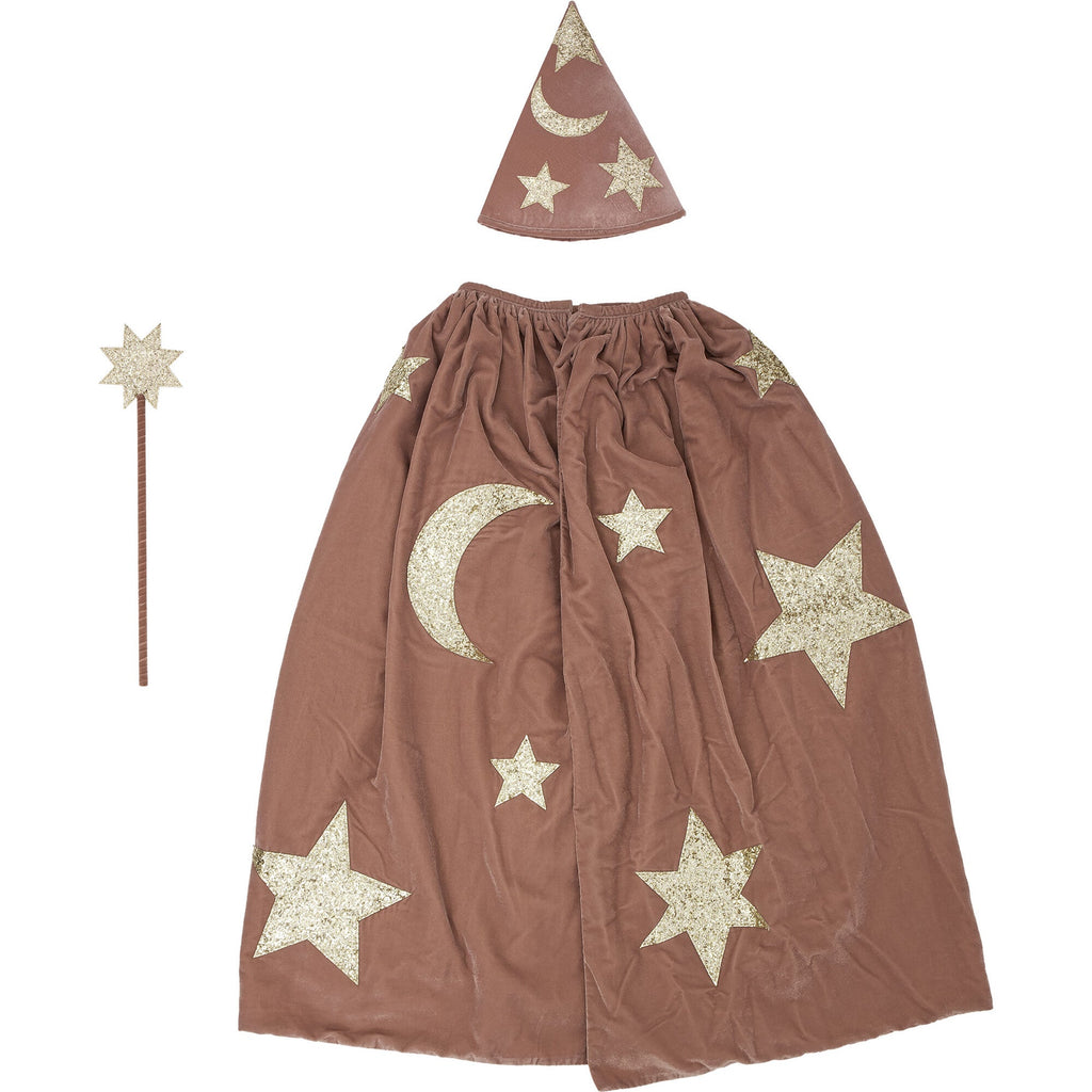 A Meri Meri pink velvet wizard costume with a matching pointy hat, all adorned with golden stars and crescent moons.