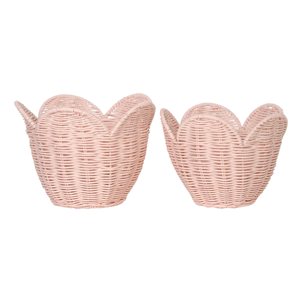 Two Olli Ella Rattan Lily Basket Sets designed to resemble open hands, positioned side by side against a black background.