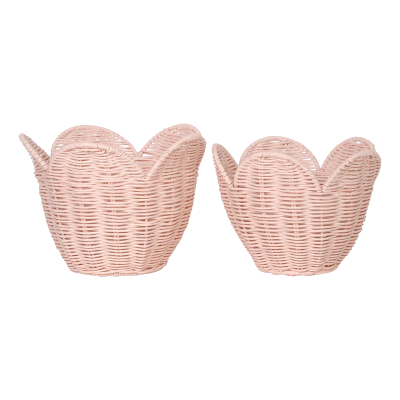 Two Olli Ella Rattan Lily Basket Sets designed to resemble open hands, positioned side by side against a black background.