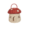 Olli Ella Red Mushroom Basket shaped like a mushroom house with a red cap, featuring white dots and window cut-outs against a striped black background.