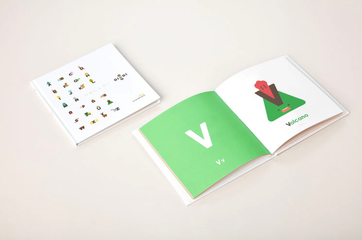 Two Ultimate Wooden Alphabet Puzzles on a light background, displaying colorful, simple illustrations and letters, with one puzzle showing the letter 'v' and a hand sign for "welcome.