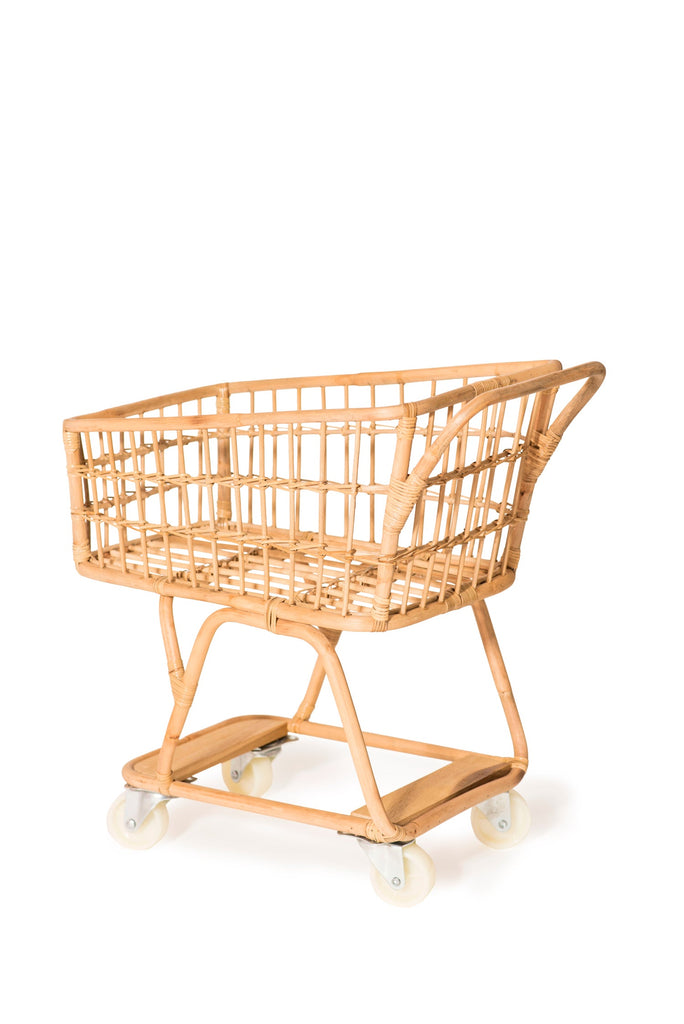 A Rattan Grocery Shopping Cart featuring an open lattice design and mounted on small white wheels, isolated on a white background.