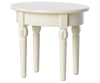 A simple white round Maileg | Mini Side Table with four slender legs on a plain background.