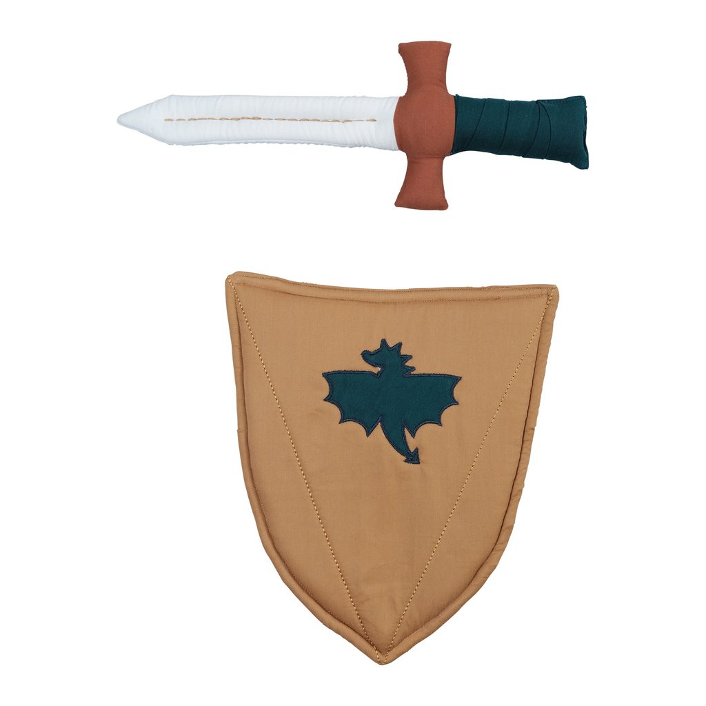 A fabric sword and a fabric shield, laying on a flat surface. 